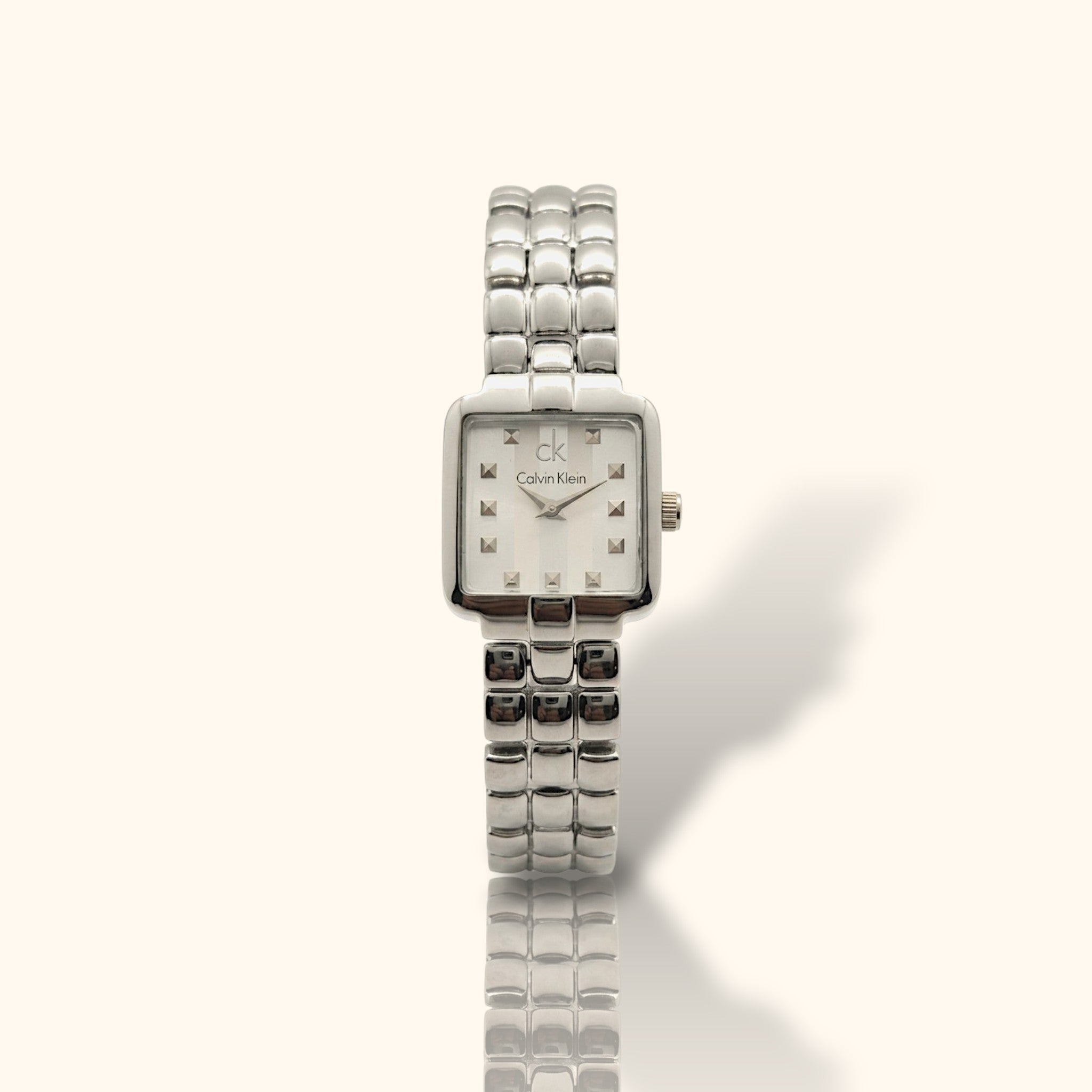 Calvin Klein Silver Essence – Square Dial All-Silver Women’s Watch
